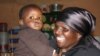 The proud granny with the boy she saved, her grandson, Luphumlo (Photo:D.Taylor)