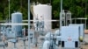 FILE - A Colonial Pipeline station is seen May 11, 2021, in Smyrna, Georgia, near Atlanta. Colonial Pipeline, which delivers about 45% of the fuel consumed on the East Coast, halted operations after revealing a cyberattack it said had affected some of its systems.