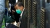 FILE - Democracy advocate Jimmy Lai arrives at Hong Kong's Court of Final Appeal in Hong Kong Feb. 1, 2021.