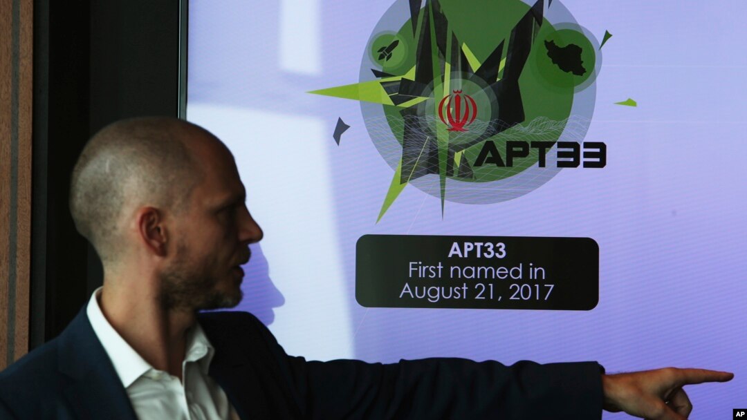 Alister Shepherd, the director of a subsidiary of the cybersecurity firm FireEye, gestures during a presentation about the APT33 hacking group, which his firm suspects are Iranian government-aligned hackers, in Dubai, United Arab Emirates, Sept. 18, 2018.