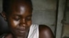 A mother with her newborn baby in a MSF clinic in Zimbabwe. For many illegal immigrants, MSF facilities offer their only chance of health care