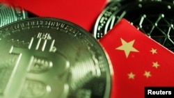 A Chinese flag is seen among representations of Bitcoin and other cryptocurrencies in this illustration picture taken June 2, 2021. REUTERS/Florence Lo/Illustration