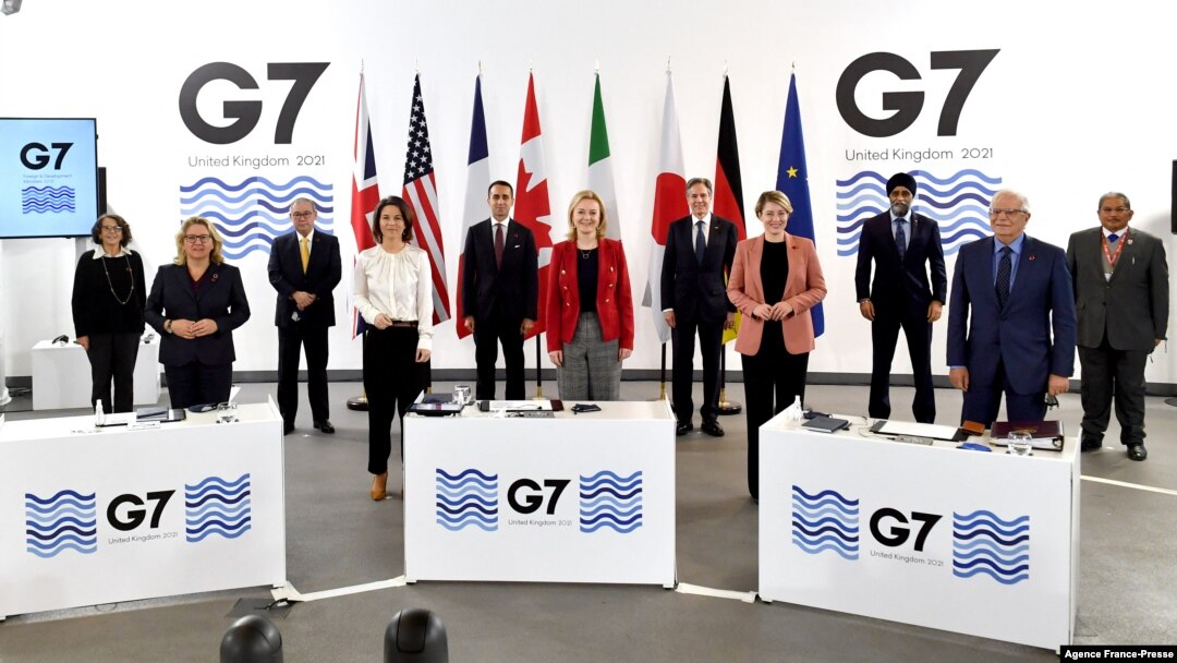 G-7 Foreign and Development Ministers pose for a group photograph during the final day of the G-7 summit in Liverpool, northwest England, Dec. 12, 2021.