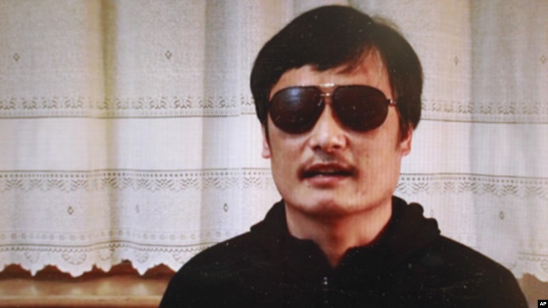 In this image made from video, blind legal activist Chen Guangcheng is seen on a video posted to YouTube Friday, April 27, 2012 by overseas Chinese news site Boxun.com. 
