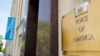 FILE - Signage is seen on the Voice of America building in Washington, June 15, 2020.