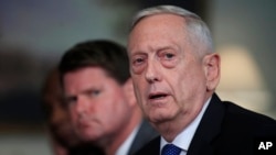 Defense Secretary Jim Mattis responds to a reporter's question during a meeting with and Philippine Secretary of National Defense Delfin Lorenzana at the Pentagon, Sept. 18, 2018. 