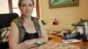 Ursula Wania reads the future in tarot cards from the quiet of a study in her home in Sharonlea, a suburb of Johannesburg, South Africa. (Photo by Darren Taylor)