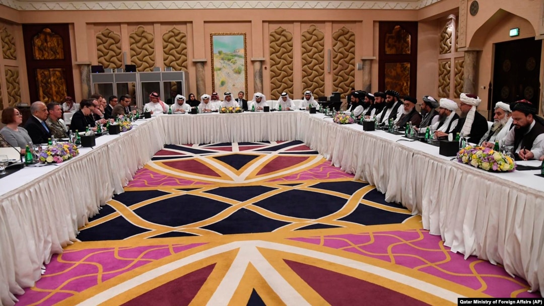 Special Envoy of the Qatar FM for Counterterrorism and Mediation, Mutlaq Bin Majid Al-Qahtanithe, U.S. Special Envy for Afghanistan, Zalmay Khalilzad, and Deputy Commander of the Taliban Movement for Political Affairs, Mulla Abdul Ghani Berader, hold talks in Doha, Feb. 25, 2019.