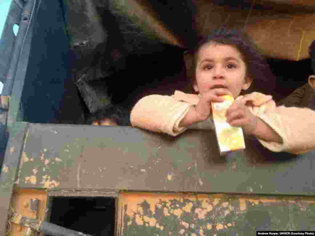 6 year-old Nisreen starting her 450 km trip to her new home as a refugee from the remote eastern Jordan-Syria border.