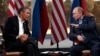 President Barack Obama (L) meets with Russian President Vladimir Putin during the G8 Summit in Northern Ireland, June 17, 2013. 