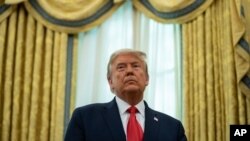 El presidente Donald Trump protagoniza una ceremonia de imposición de la Medalla a la Libertad en la Casa Blanca, el jueves 3 de diciembre.
