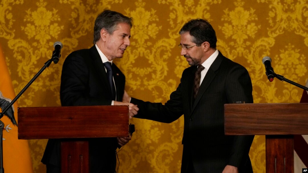 U.S. Secretary of State Antony Blinken, left, and Ecuador's Foreign Minister Mauricio Montalvo, talk at the end of a press conference at government palace in Quito, Ecuador, Oct. 19, 2021. 