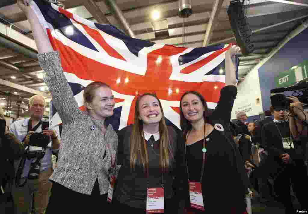 Supporters from the "No" Campaign celebrate as they hold up a Union flag, in Edinburgh, Scotland, Sept. 19, 2014.
