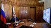 El presidente de Rusia, Vladimir Putin, asiste a una reunión del Consejo de Estado Supremo del Estado Unión de Rusia y Bielorrusia el Día de la Unidad, a través de una teleconferencia, en Sebastopol, Crimea, el 4 de noviembre de 2021.
