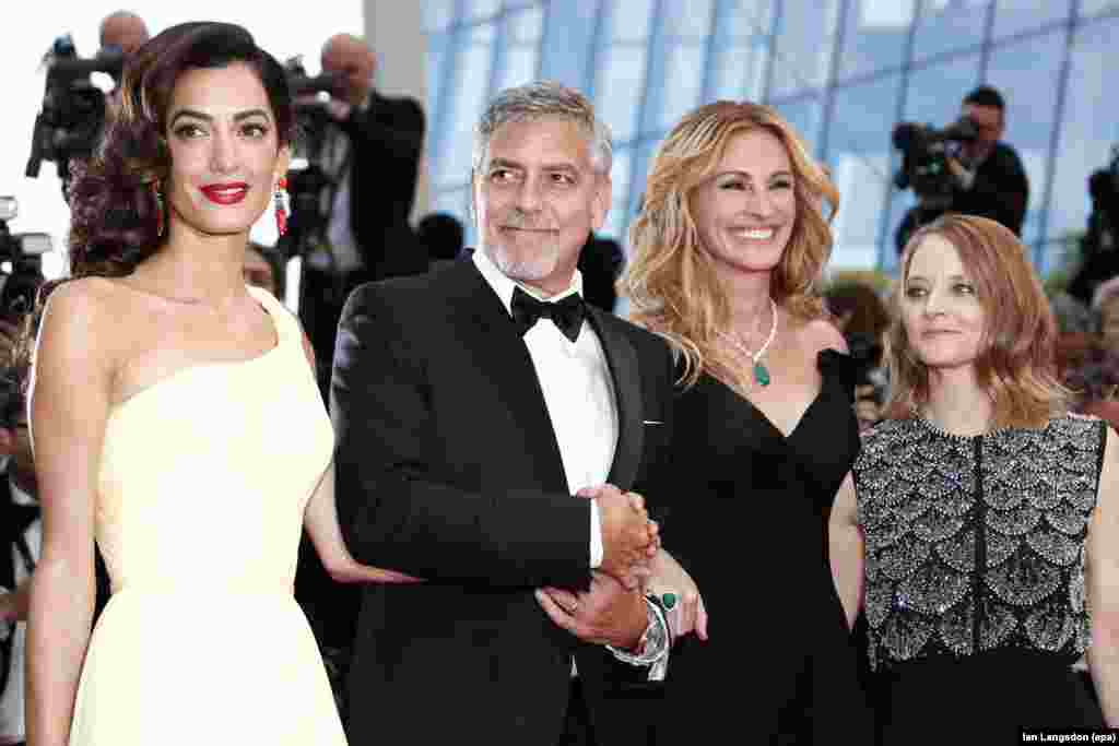(Ki-Ka) Pengacara HAM Inggris Amal Clooney, aktor AS George Clooney, aktris Julia Robert, dan sutradara Jodie Foster tiba dalam acara penayangan film ‘Money Monster’ dalam acara tahunan Festival Film Cannes ke-69, di Cannes, Perancis.