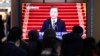 People watch a TV screen showing the live broadcast of South Korean President Moon Jae-in's New Year's speech at the Seoul Railway Station in Seoul, South Korea, Tuesday, Jan. 7, 2020. Moon said he hopes to see North Korean leader Kim Jong Un…