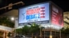 A billboard for the third Republican presidential primary debate is seen at the Adrienne Arsht Center for the Performing Arts in Miami, Florida on November 7, 2023.