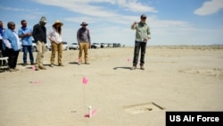 Archaeologist Daron Duke speaks with visitors at an archaeological site on the Utah Test and Training Range, July 18, 2022.