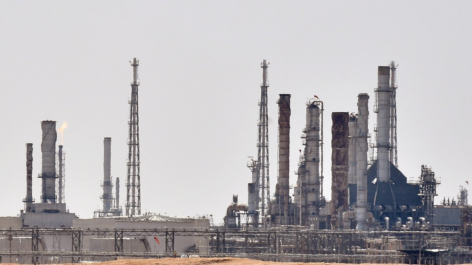 FILE - An Aramco oil facility near al-Khurj area, just south of the Saudi capital, Riyadh. Oil prices on track on Monday to fall for the third month in a row.
