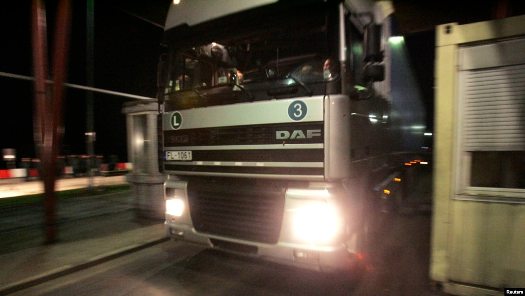 FILE - A truck is seen stopped at the Lithuanian border.