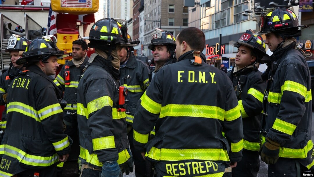 Fire Department of New York (FDNY) firefighters stand near Port Authority Bus Terminal after reports of an explosion in Manhattan, New York, U.S., Dec. 11, 2017. 