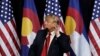 U.S. Republican presidential nominee Donald Trump puts his hand to his ear as he speaks at a campaign rally in Pueblo, Colorado, Oct. 3, 2016. 