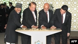 In this photograph released by the Press Information Bureau (PIB) on December 13, 2015, Indian Vice President, Hamid Ansari (L), along with President of Turkmenistan, Gurbanguly Berdimohamedov (R), President of Afghanistan, Ashraf Ghani (2R) and Prime Min