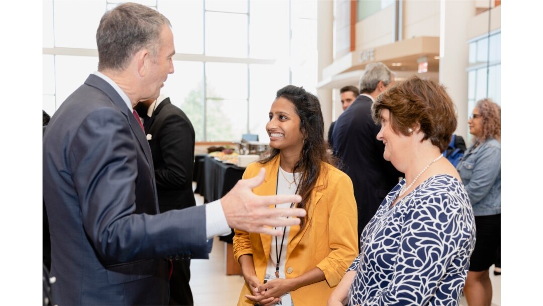 Governor Ralph Northam talks with George Mason University senior Dolica Gopisetty and President Anne Holton before an Amazon Web Services cloud computing degree launch event, Sept. 20, 2019. (Lathan Goumas/Office of Communications and Marketing)