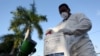 A health worker prepares insecticide before fumigating a neighborhood in San Juan, Puerto Rico, Jan. 27, 2016. On Sunday, an elderly man on the U.S. territory became the first victim of the Zika virus on U.S. soil.