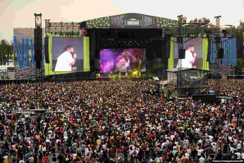 Thousands of music fans attend the music festival "Vive Latino" as Mexico's health authorities began rolling out tougher measures to contain the spread of coronavirus and calling for an end to large gatherings, in Mexico City, March 15, 2020.