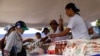 Inflación en Venezuela se desacelera, pero muchos votantes aún no pueden llegar a fin de mes