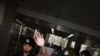 Chinese security guards block journalists at the entrance of a hospital where blind activist lawyer Chen Guangcheng is recuperating in Beijing, May 4, 2012.
