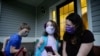 Parents Struggle as Schools Reopen Amid Coronavirus Surge 