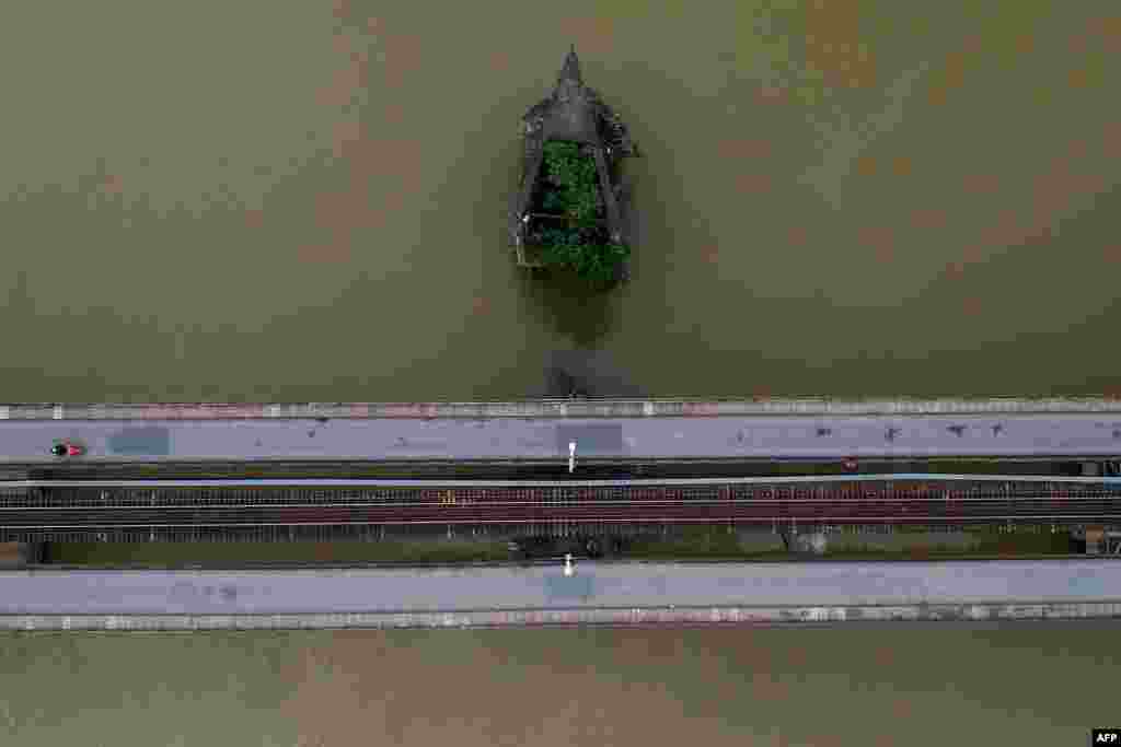 This aerial photo shows a deserted Long Bien bridge during the government imposed "complete social isolation" as a preventive measure against the spread of COVID-19 coronavirus in Hanoi, Vietnam.