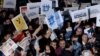 FILE - People rally in support of press freedom in Istanbul, Turkey, Oct. 9, 2015.