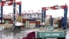 FILE - Containers are seen at the port in San Pedro, Calif., March 22, 2018.