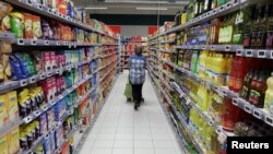 A customer shops in a supermarket in Nice, France, Jan. 16, 2017.
