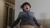Parasite actor Jeong Hyeonjun celebrates as he watches a live broadcast of South Korean director Bong Joon Ho receiving the award for best original screenplay for "Parasite" at the Oscars, in Seoul, Feb. 10, 2020. 