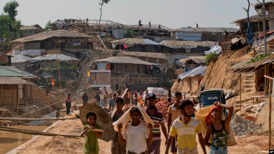 Rohingya refugees rebuild their makeshift houses, in preparation for the approaching monsoon season, at the Kutupalong Rohingya refugee camp in Kutupalong, Bangladesh, April 28, 2018.