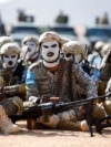 FILE - Puntland security forces parade newly trained soldiers and equipment to combat Islamic State in Bosasso, Puntland region, Somalia, on Jan. 30, 2025.
