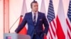 Глава Пентагона Пит Хегсет выступает на пресс-конференции в Варшаве. 14 февраля 2025 г. 