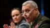 FILE - Marines Lt. Gen. John Paxton testifies on Capitol Hill, Feb. 22, 2010. Now a general and the Corps' assistant commandant, Paxton told senators on March 15, 2016, that the Marines are "no longer in a healthy position to generate current readiness."