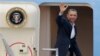 FILE - President Barack Obama waves from Air Force One as he departs West Palm Beach, where he spent the Presidents Day weekend playing golf.