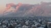 Steam rises from chimneys of the Gazprom Neft's oil refinery in Omsk, Russia November 18, 2022. (REUTERS/Alexey Malgavko)