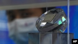 Чип Changan 510, экспонированный на международной выставке высоких технологий в Пекине (архивное фото)