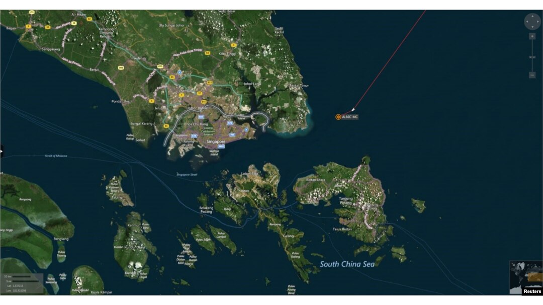 A map shows the location where the Alnic MC merchant vessel came to a halt after a collision with the guided-missile destroyer USS John S. McCain east of Singapore August 21, 2017.