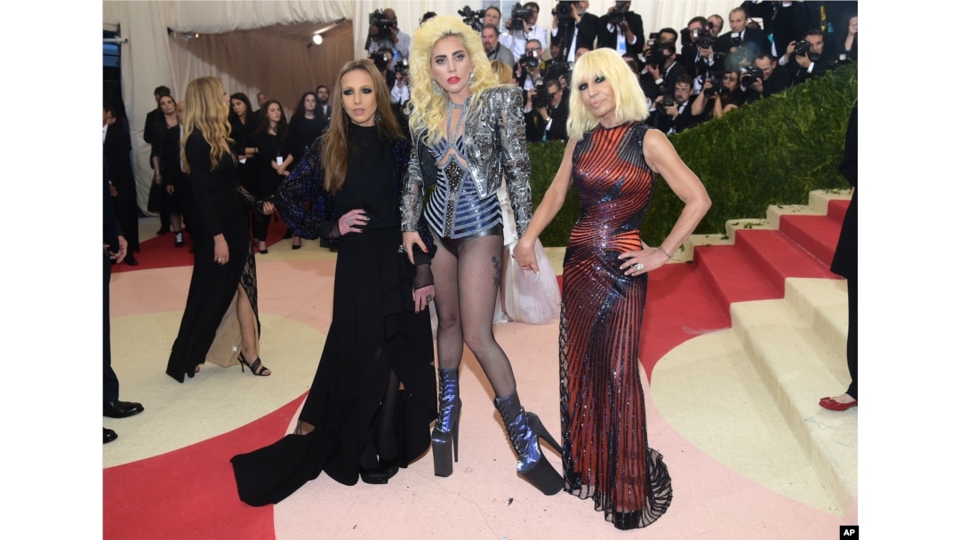 Allegra Versace, from left, Lady Gaga and Donatella Versace arrive at The Metropolitan Museum of Art Costume Institute Benefit Gala, celebrating the opening of "Manus x Machina: Fashion in an Age of Technology" on May 2, 2016, in New York.