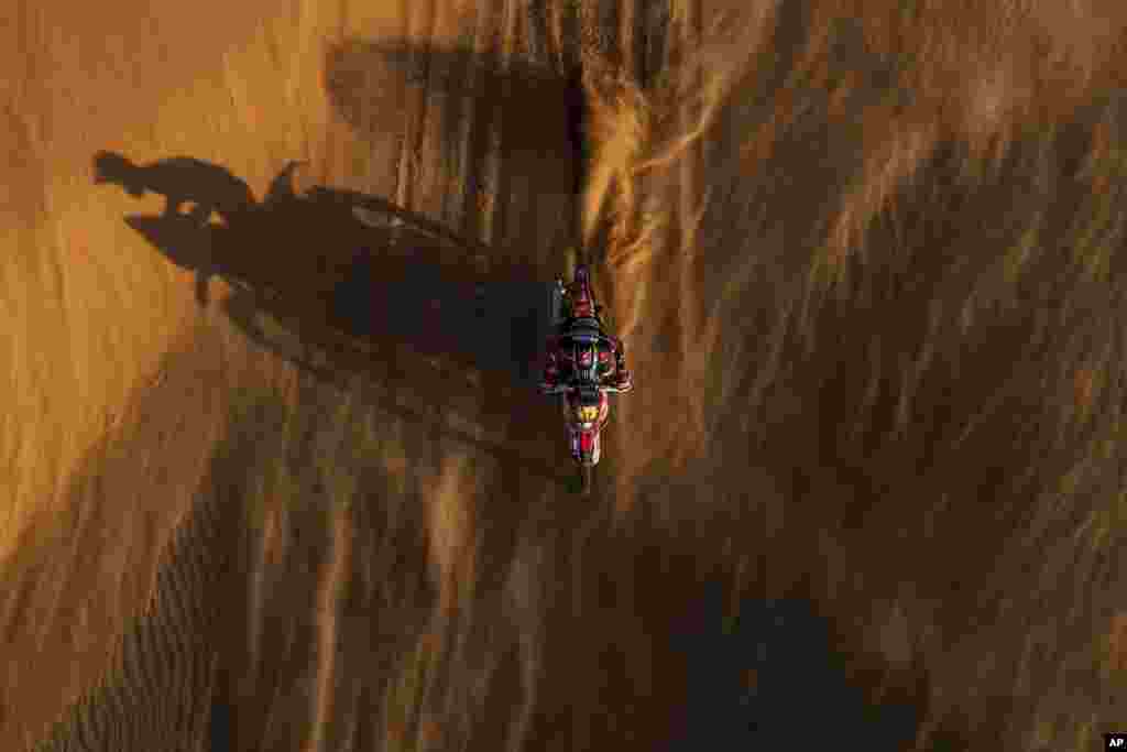 Jose Ignacio Cornejo Florino of Chile rides his Honda motorbike during stage eleven of the Dakar Rally between Shubaytah and Haradth, Saudi Arabia.