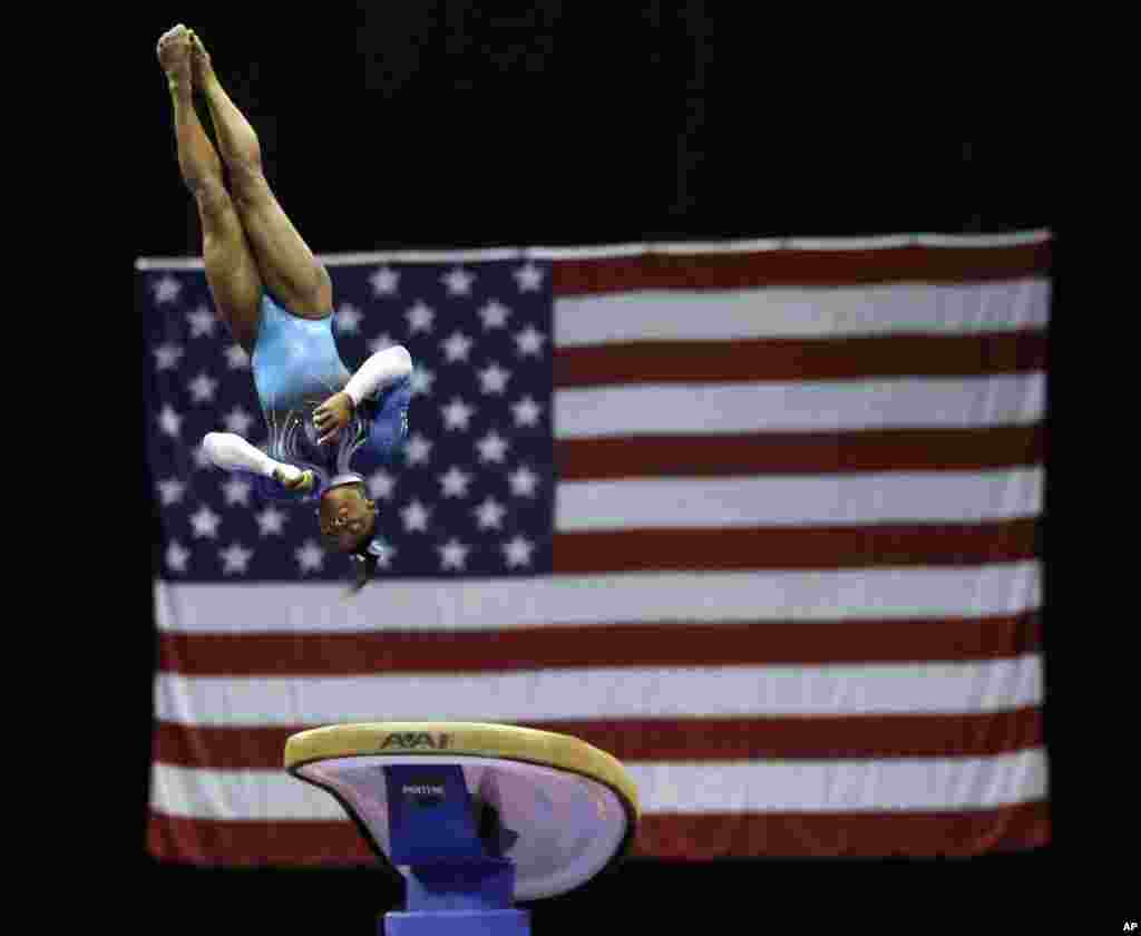 Simone Biles competes in the vault during the U.S. Women's Gymnastics Championships in St. Louis, Missouri, June 26, 2016.