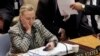 Campaign 2016 Clinton Emails: FILE - In this March 12, 2012, file photo, then-Secretary of State Hillary Clinton checks her mobile phone after her address to the Security Council at United Nations headquarters. In a rare step, the FBI on Friday, Sept. 2, 2016, published scores of pages about confidential interviews with Hillary Clinton and others from its recently closed investigation into the former secretary of state’s use of a private email server.